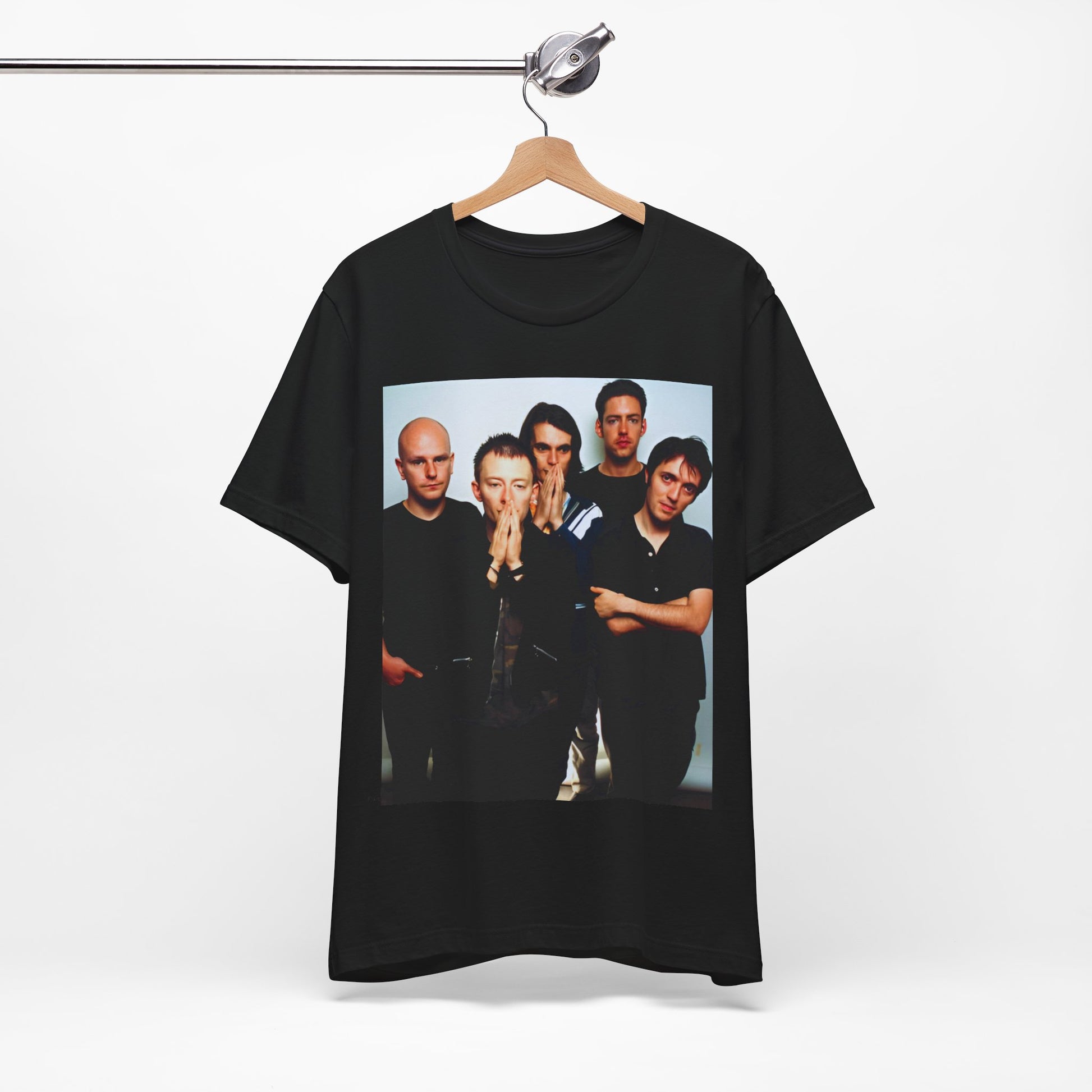 A black graphic t-shirt featuring a bold alt rock superstar graphic of Radiohead.