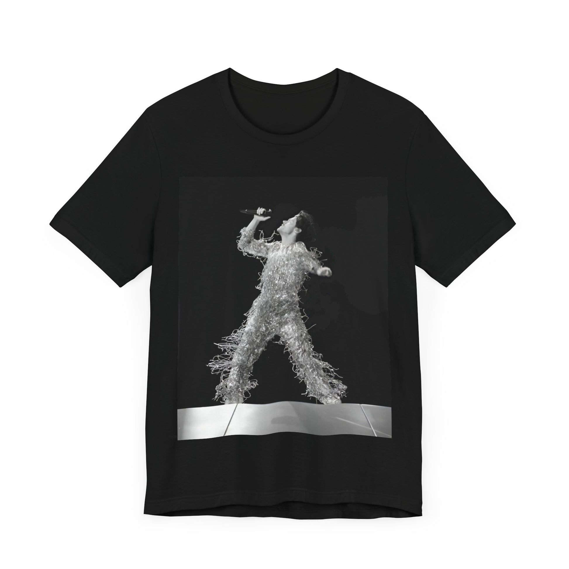 A black graphic t-shirt featuring a boxy pop aesthetic graphic of Harry Styles.