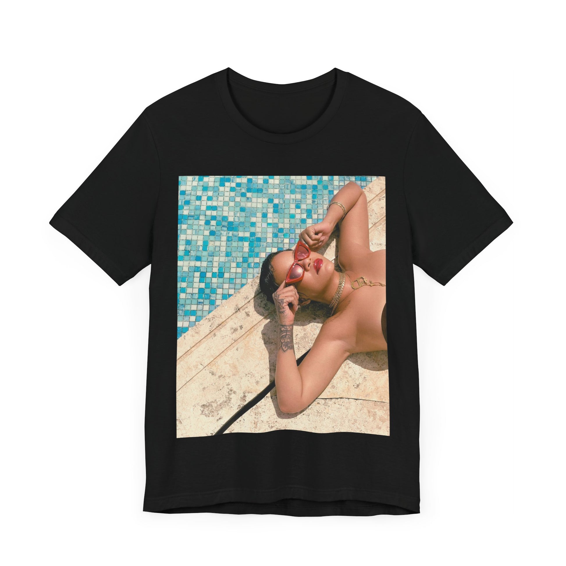 A black graphic t-shirt featuring a graphic of Rihanna in swimwear as a pop star queen.