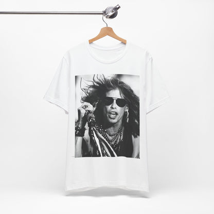 A black graphic t-shirt featuring a black and white photo of Aerosmith's Steven Tyler with his signature scarf and microphone, captured during a dynamic performance.
