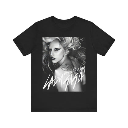 A black graphic t-shirt featuring a modern pop essential graphic of Lady Gaga.