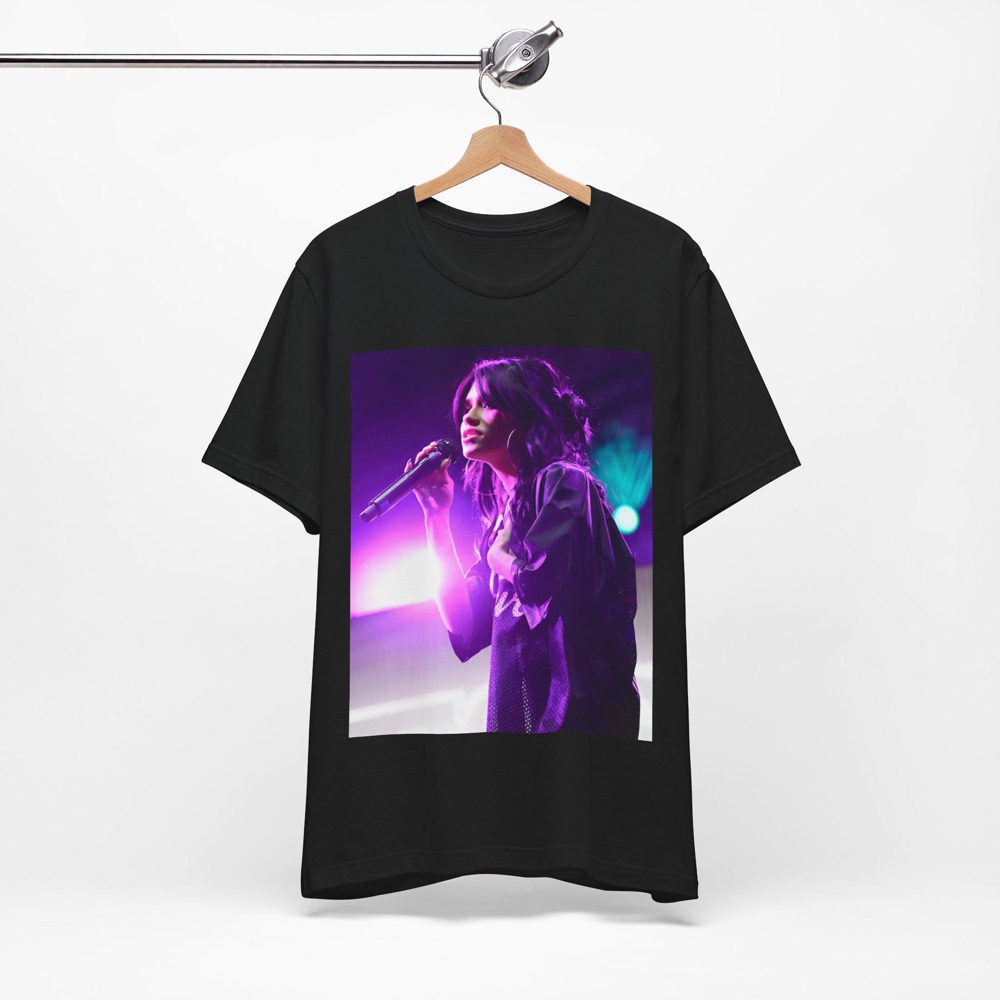 A black graphic t-shirt featuring a graphic or photo of Nessa Barrett performing live on stage.