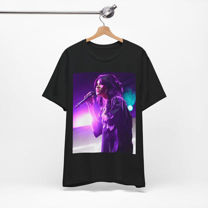 A black graphic t-shirt featuring a graphic or photo of Nessa Barrett performing live on stage.