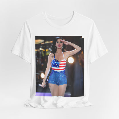 A black graphic t-shirt featuring a vintage graphic related to Katy Perry's 'Firework' song or era.
