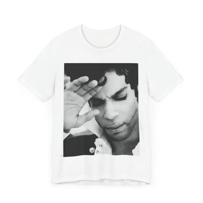 A black graphic t-shirt featuring a black and white graphic or photo portrait of Prince.