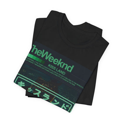 A black graphic t-shirt featuring a retro graphic related to The Weeknd's 'Kiss Land' album.