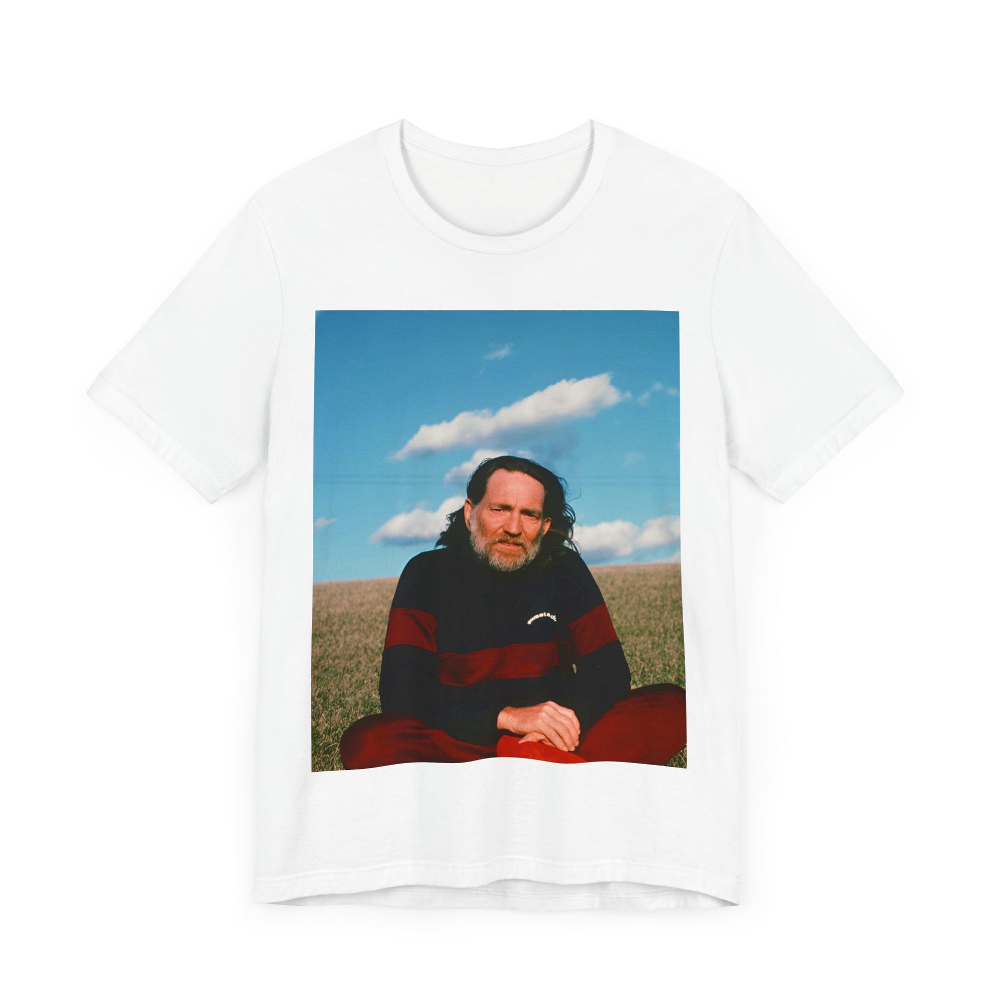 A black graphic t-shirt featuring a classic outlaw country graphic of Willie Nelson.