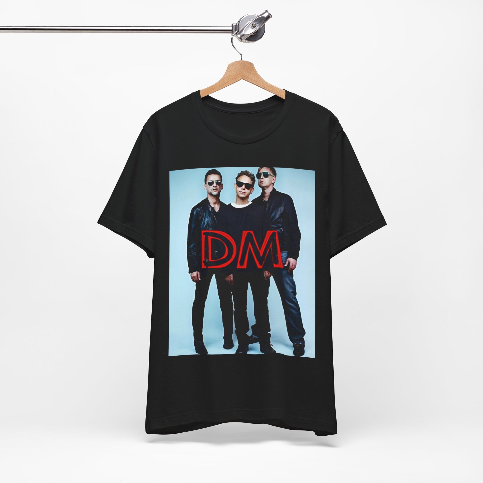 A black graphic t-shirt featuring a retro electropop graphic of Depeche Mode.
