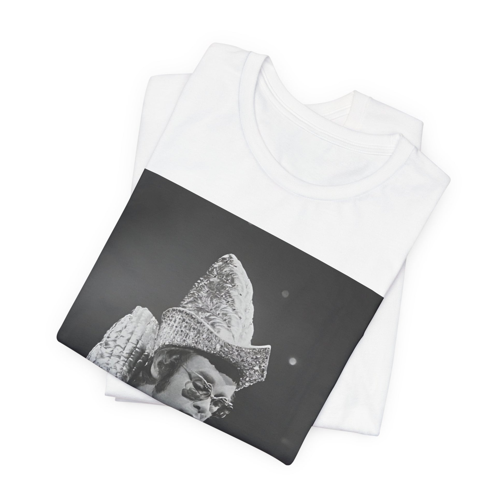 A black graphic t-shirt featuring a 70s pop aesthetic graphic of Elton John.