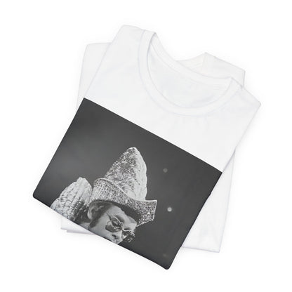 A black graphic t-shirt featuring a 70s pop aesthetic graphic of Elton John.