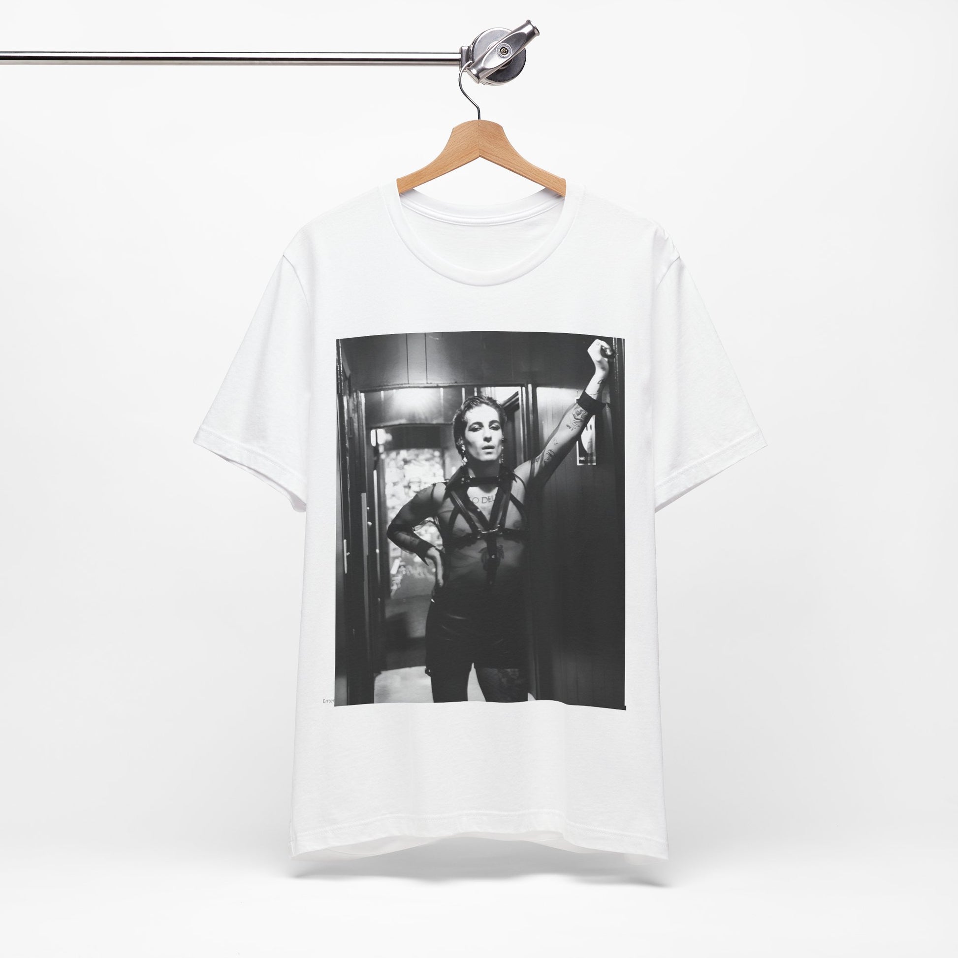 A black graphic t-shirt featuring a graphic of Maneskin emphasizing a rebel rock spirit.