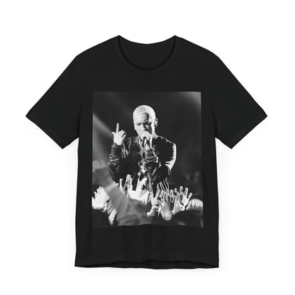 A black graphic t-shirt featuring a graphic or photo of Eminem performing live on stage.