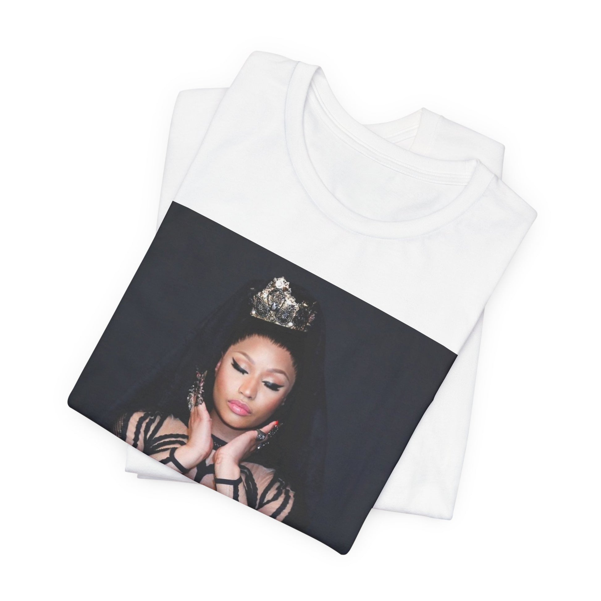 A black graphic t-shirt featuring a vintage graphic of Nicki Minaj as the Queen of Rap.