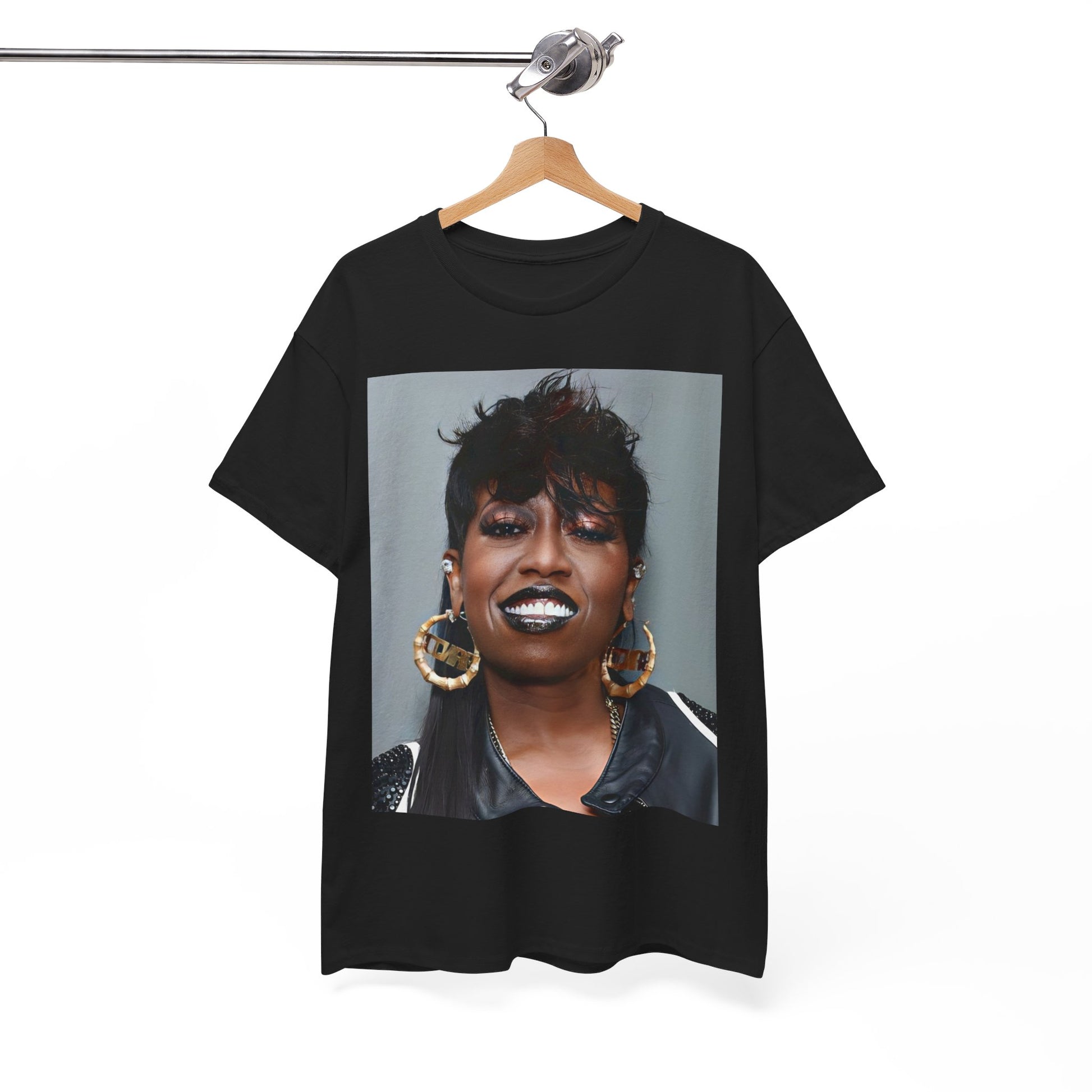 A black graphic t-shirt featuring a bold graphic of Missy Elliott as a rap superstar.