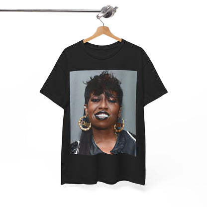 A black graphic t-shirt featuring a bold graphic of Missy Elliott as a rap superstar.