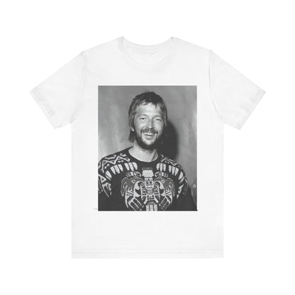 A black graphic t-shirt featuring a 70s photo portrait of Eric Clapton.