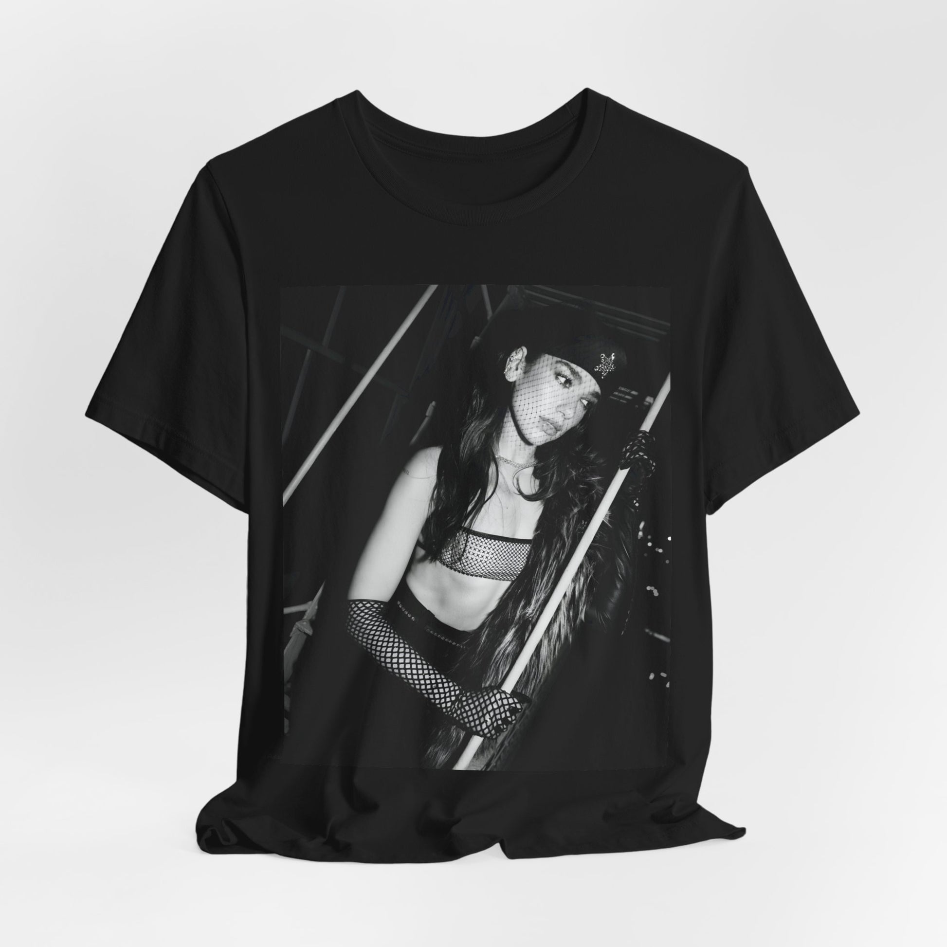 A black graphic t-shirt featuring a black and white, monochrome graphic or portrait of Dua Lipa.