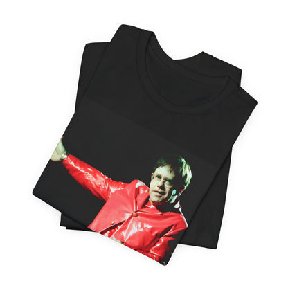 A black graphic t-shirt featuring a vintage photo portrait of Elton John as a music legend.
