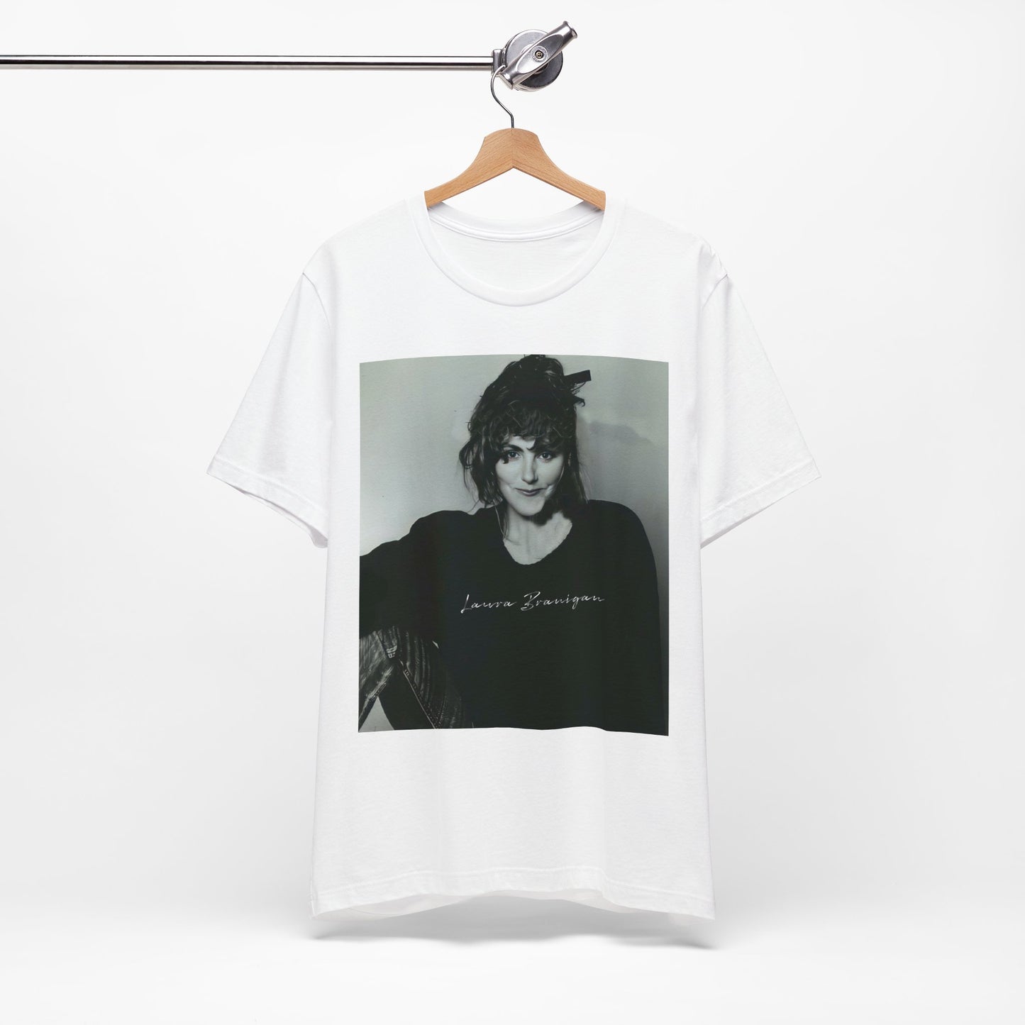 A black graphic t-shirt featuring a casual 80s pop fan graphic of Laura Branigan.