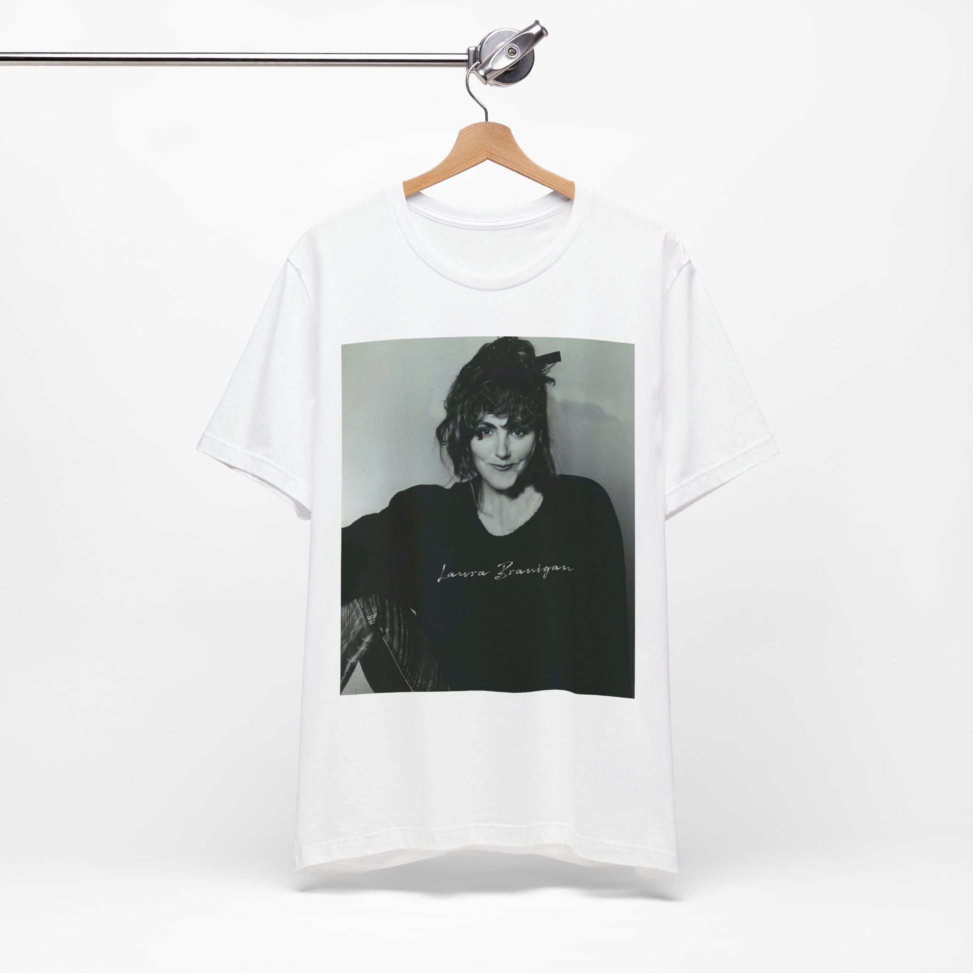 A black graphic t-shirt featuring a casual 80s pop fan graphic of Laura Branigan.