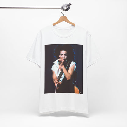 A black graphic t-shirt featuring a 90s live performance graphic of Prince.