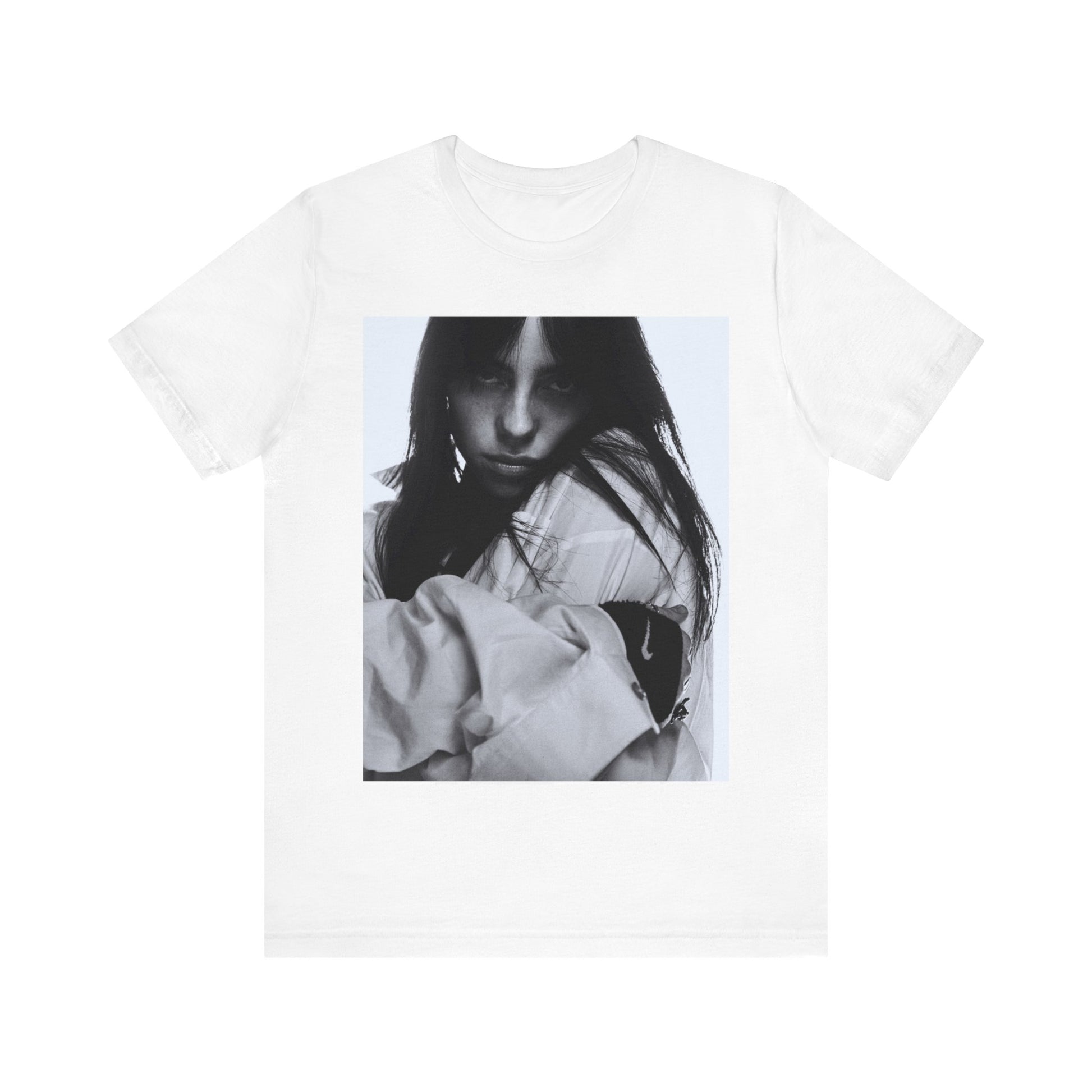 Billie Eilish posing in her signature oversized designer streetwear, printed on a graphic t-shirt.