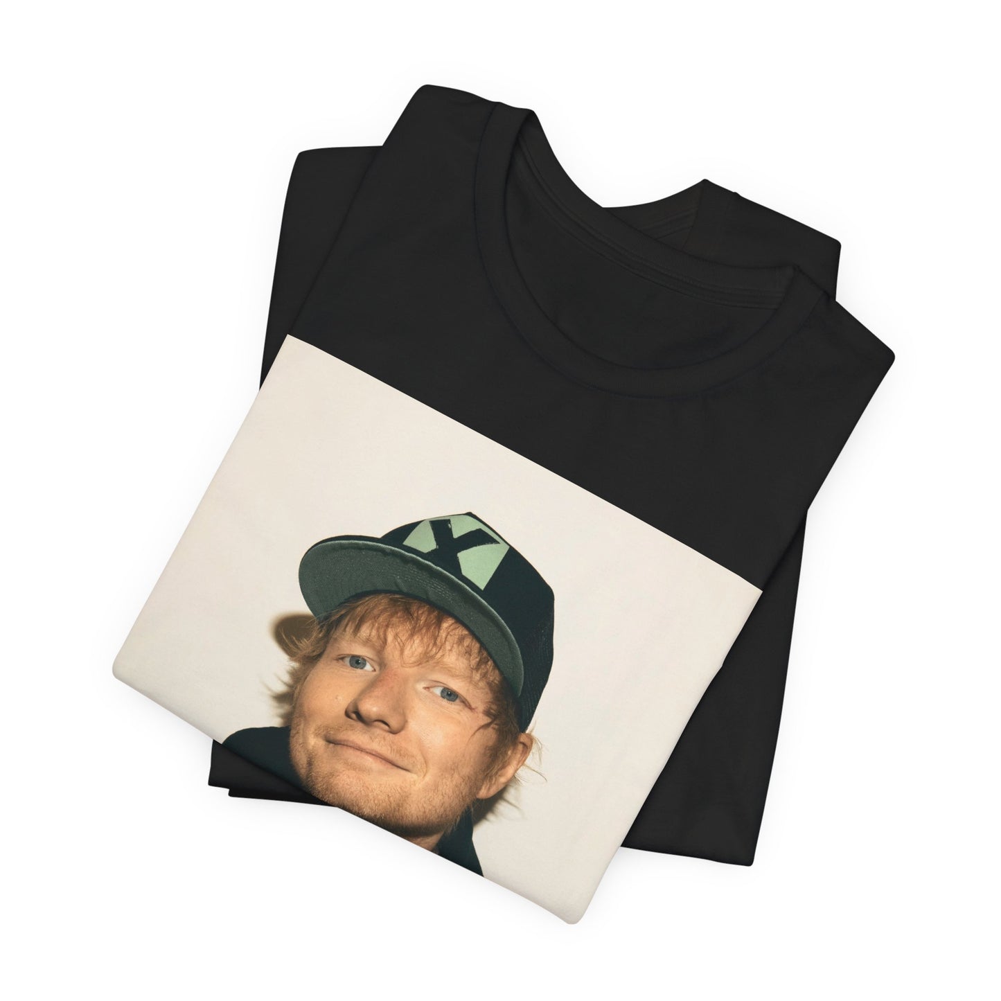 A black graphic t-shirt featuring a glamorous graphic of Ed Sheeran as a global tour icon.