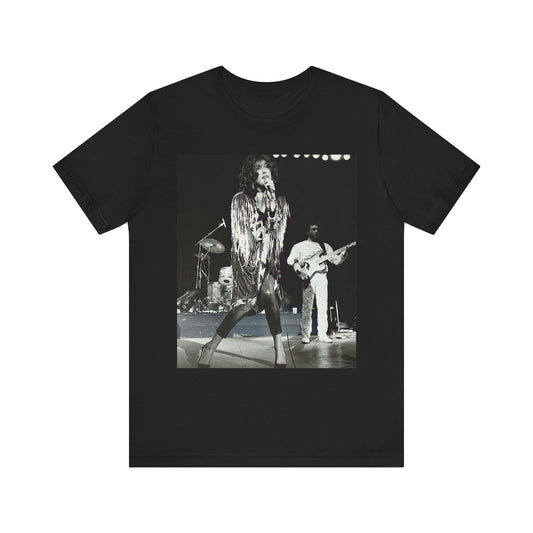 A black graphic t-shirt featuring an 80s black and white photo or graphic of Laura Branigan performing live on stage.