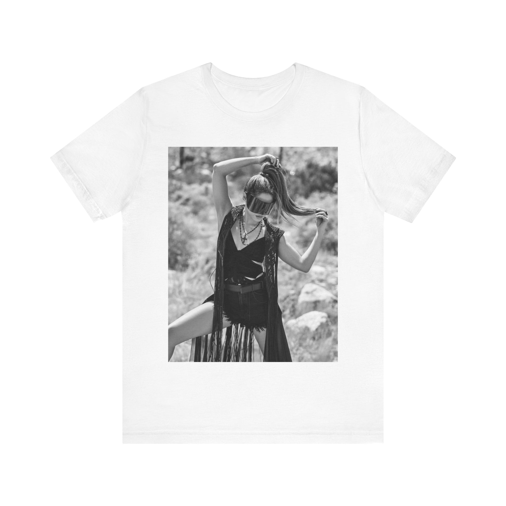 A black graphic t-shirt featuring a black and white, monochrome graphic or photo of Shakira.