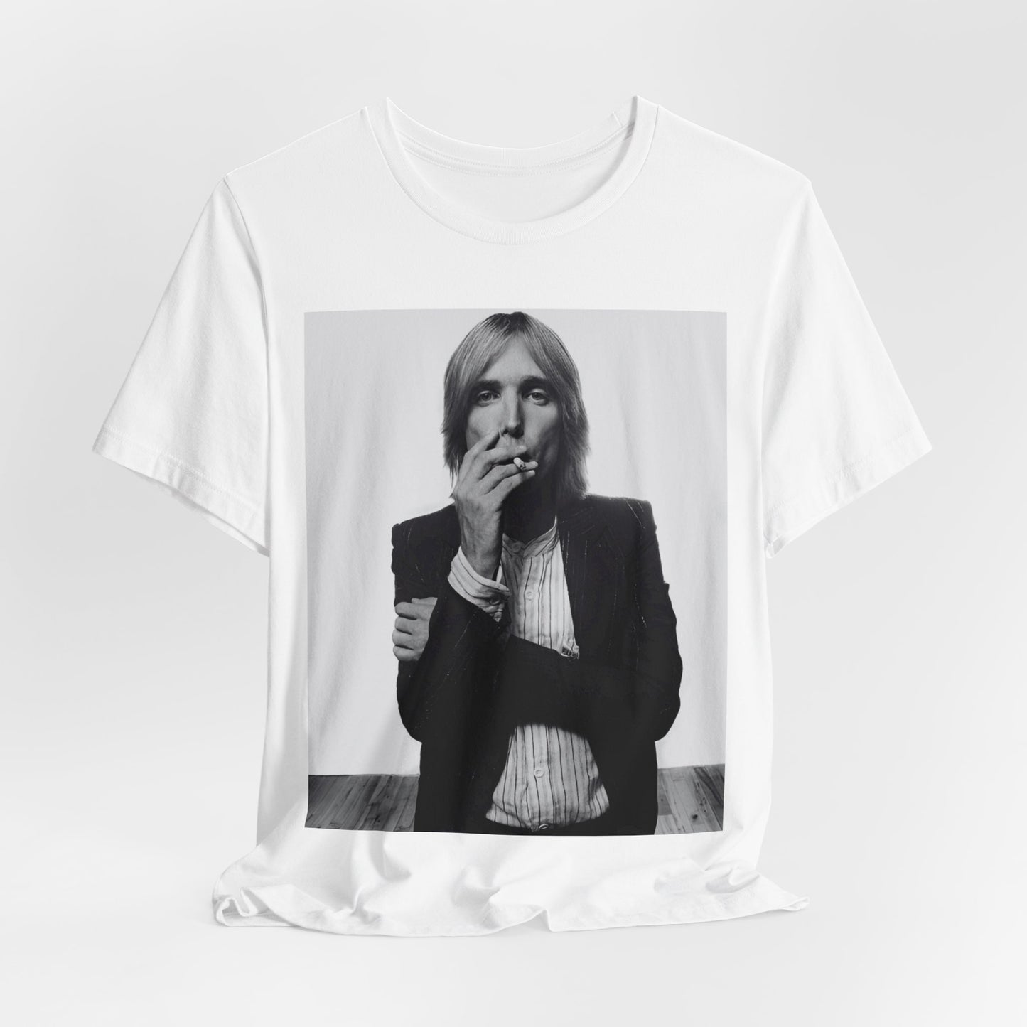 A black graphic t-shirt featuring a black and white graphic or photo of Tom Petty as a Southern rock icon.