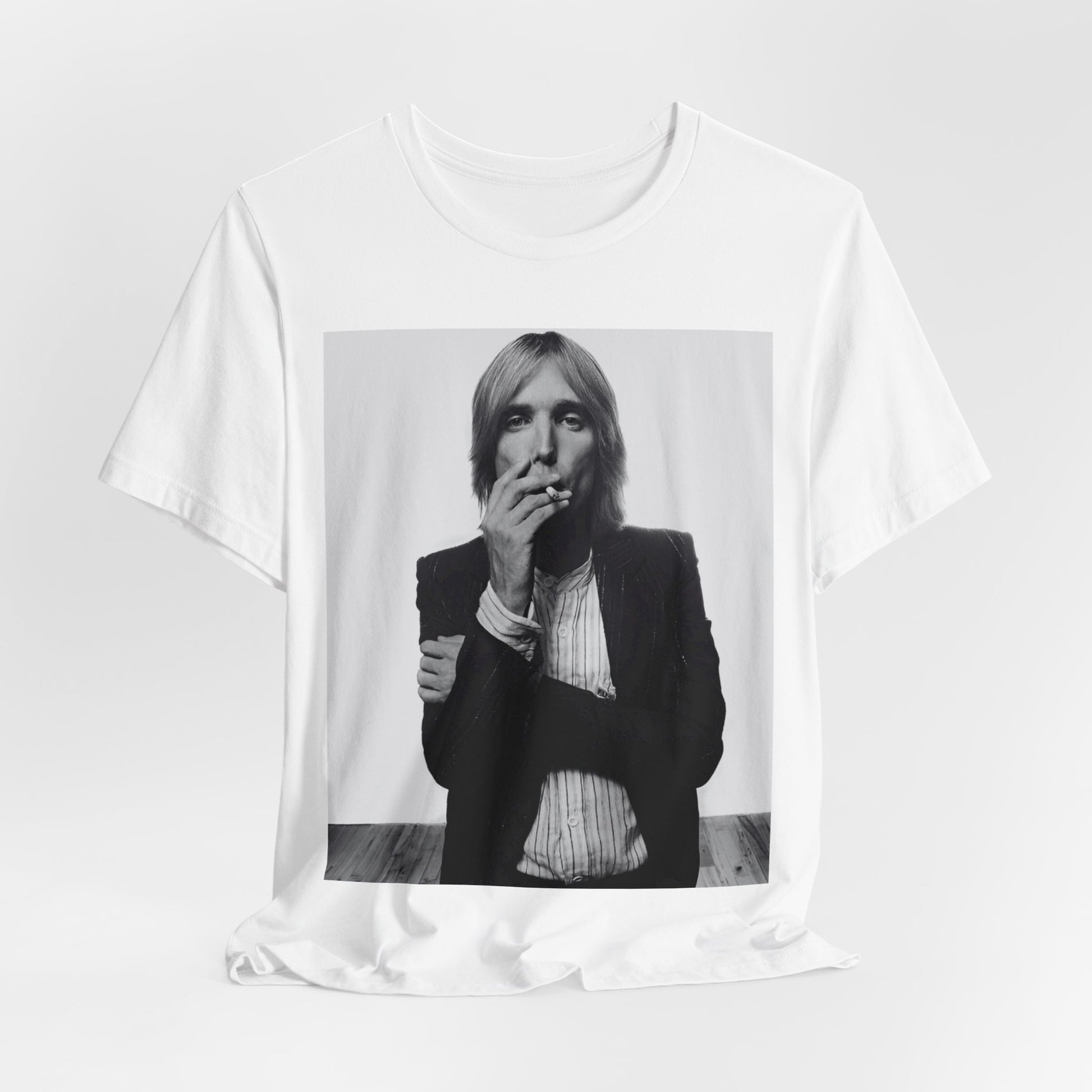 A black graphic t-shirt featuring a black and white graphic or photo of Tom Petty as a Southern rock icon.