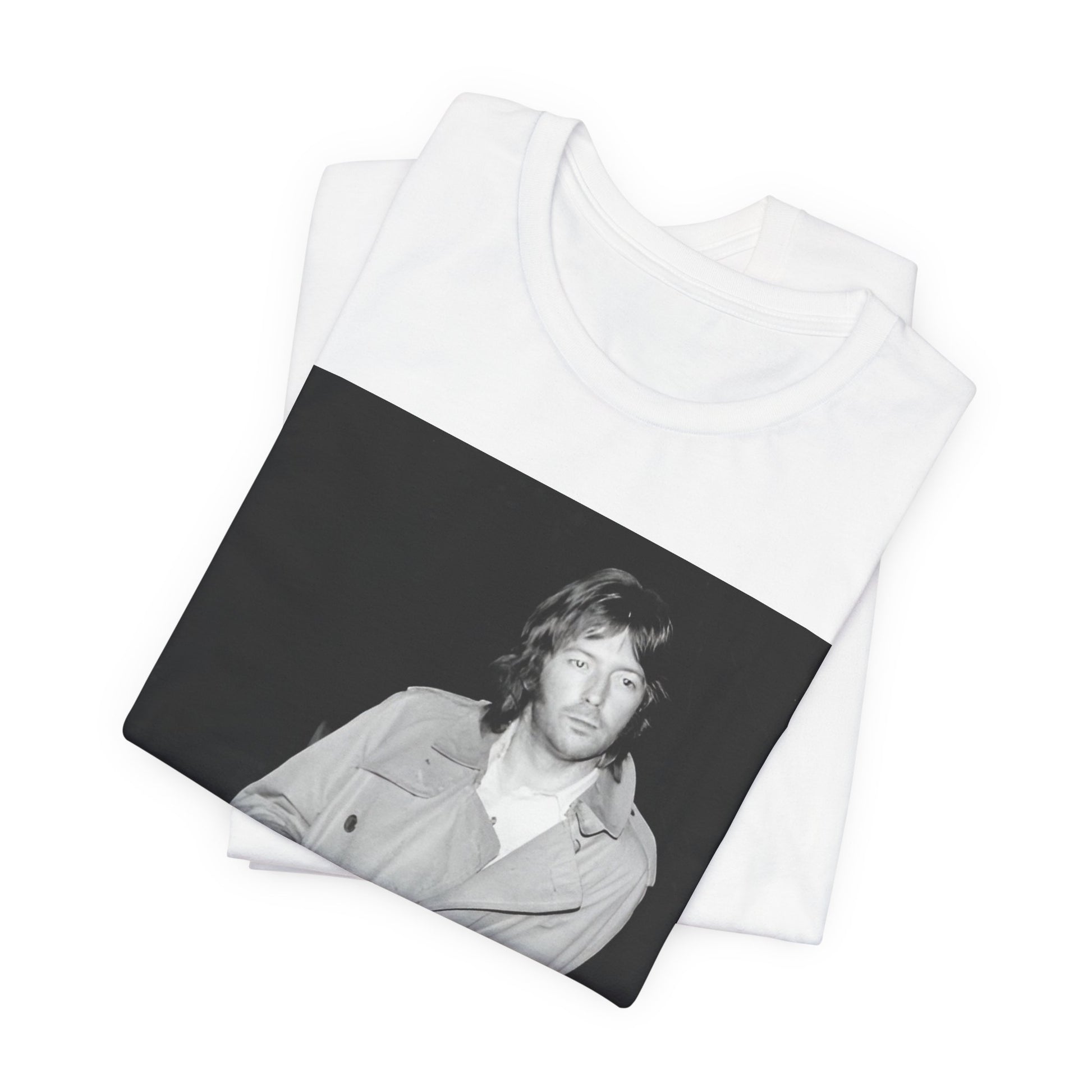 A black graphic t-shirt featuring a retro graphic of Eric Clapton as a blues master.