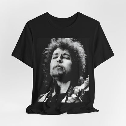 A black graphic t-shirt featuring a retro black and white graphic or photo of Bob Dylan performing live.