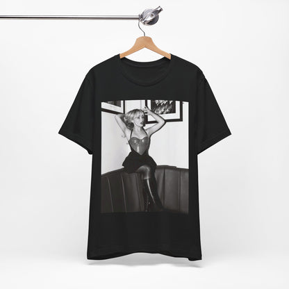 A black graphic t-shirt featuring a black and white graphic of Sabrina Carpenter as a pop princess.