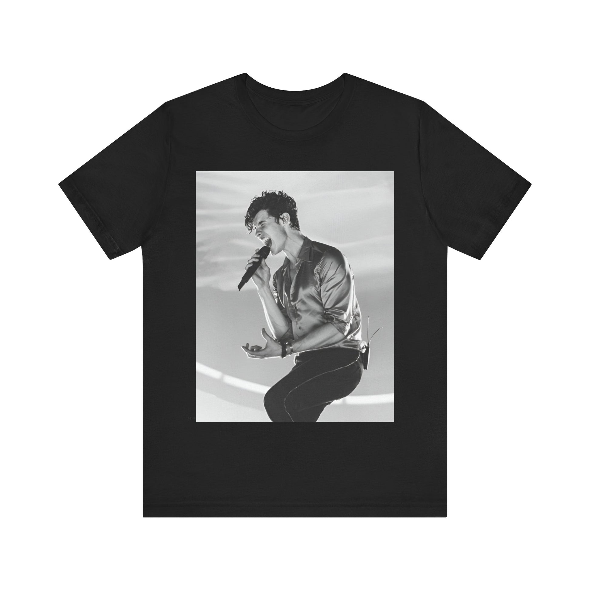 A black graphic t-shirt featuring a black and white graphic or photo of Shawn Mendes as a dreamy pop star.