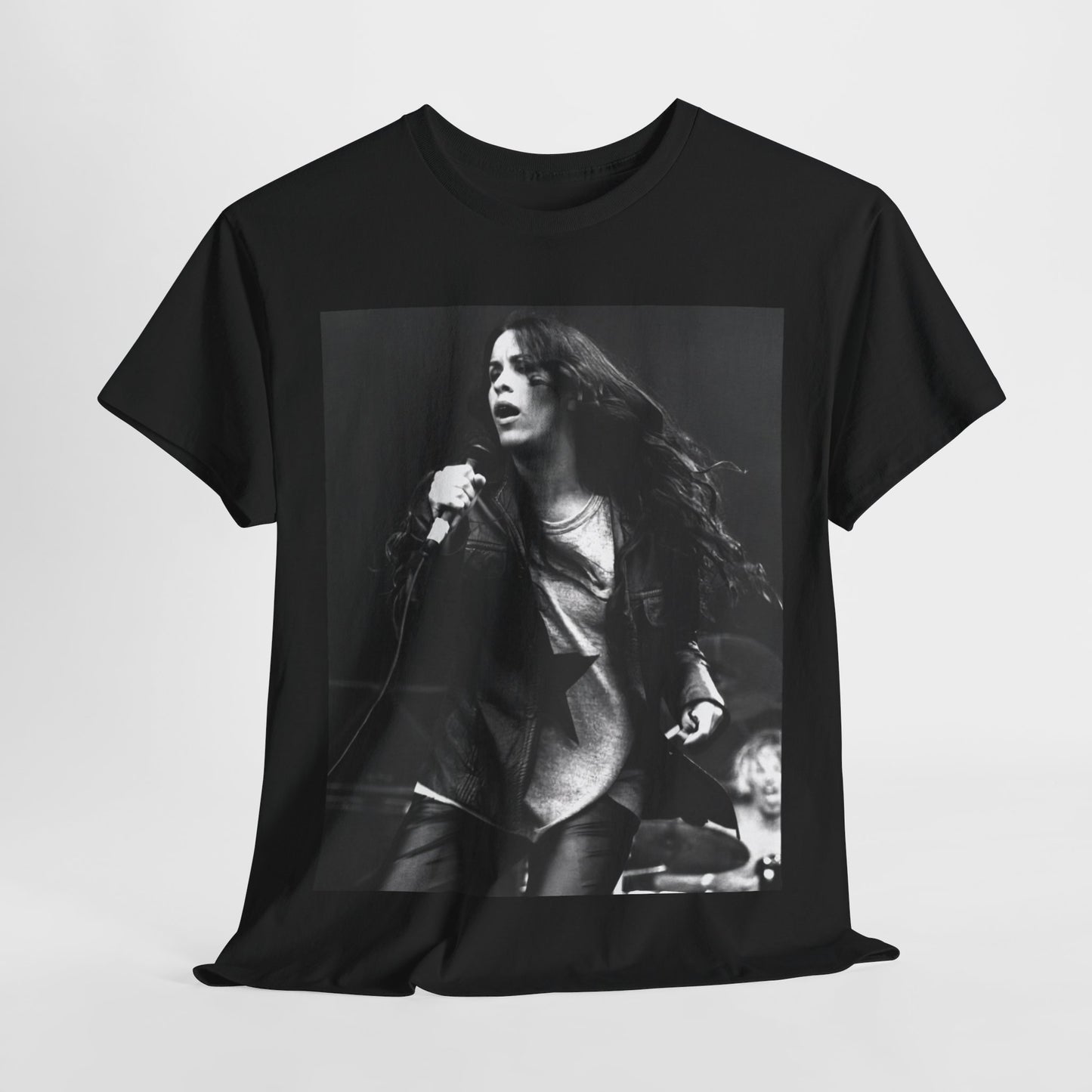 A black graphic t-shirt featuring a 90s-style concert graphic of Alanis Morissette, related to her "Jagged Little Pill" era tours.