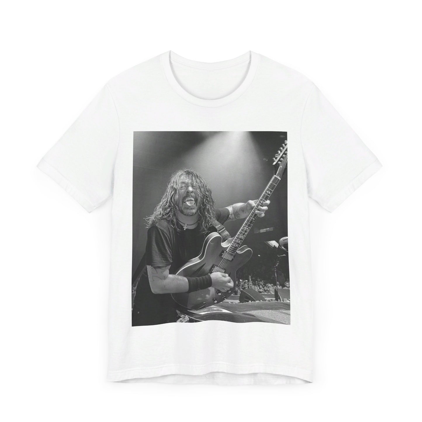 A black graphic t-shirt featuring a graphic of Dave Grohl from Foo Fighters playing guitar in concert.