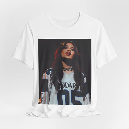 A black graphic t-shirt featuring a graphic or photo of Nessa Barrett performing live.