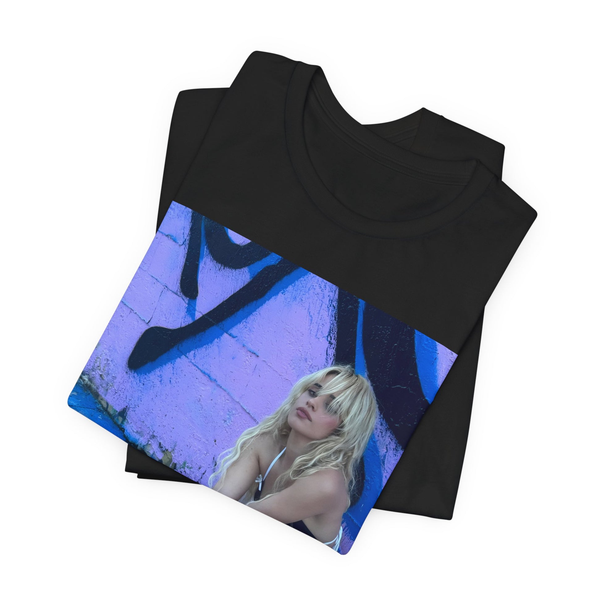 A black graphic t-shirt featuring a photo of Camila Cabello from her "Romance" album era.
