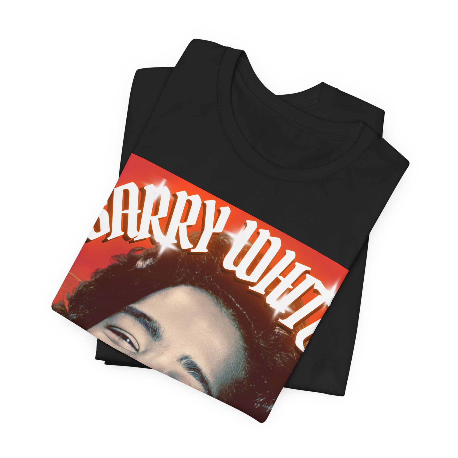 A black graphic t-shirt featuring a graphic of Barry White, emphasizing his iconic soulful presence from the 1970s.