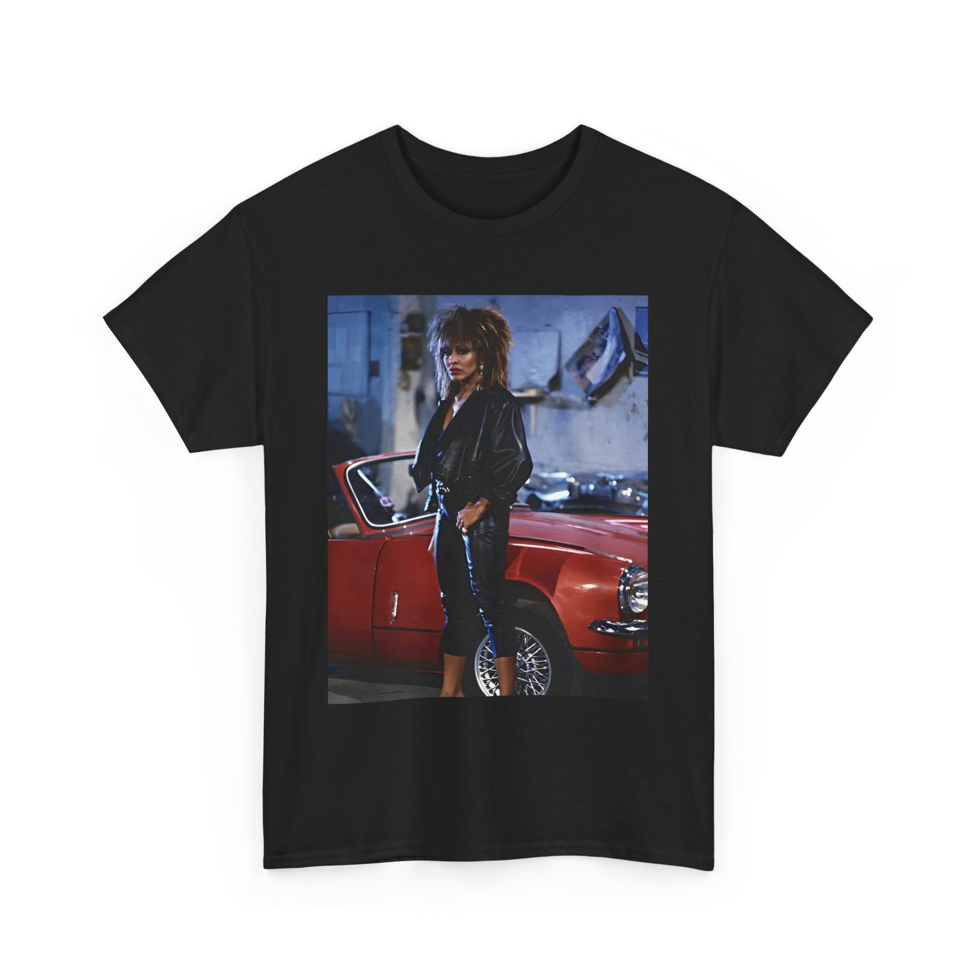 A black graphic t-shirt featuring an 80s graphic of Tina Turner as a powerful rock woman.
