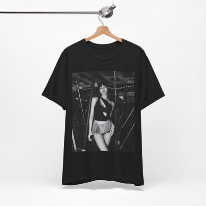 A black graphic t-shirt featuring a black and white graphic or photo of Lisa in a backstage setting.