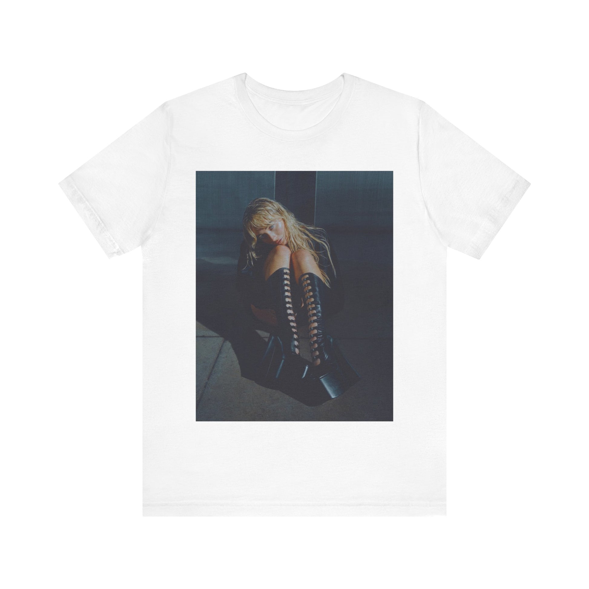 A black graphic t-shirt featuring a bold graphic of Sabrina Carpenter as a pop superstar.