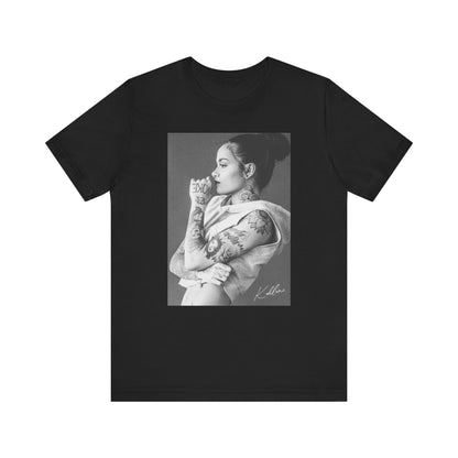 A black graphic t-shirt featuring a black and white, monochrome graphic or photo of Kehlani.