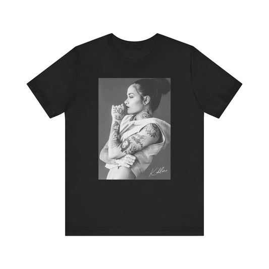 A black graphic t-shirt featuring a black and white, monochrome graphic or photo of Kehlani.