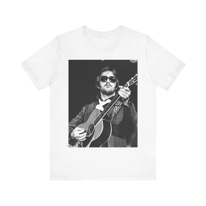 A black graphic t-shirt featuring a graphic of Eric Clapton with a chill blues rock vibe.