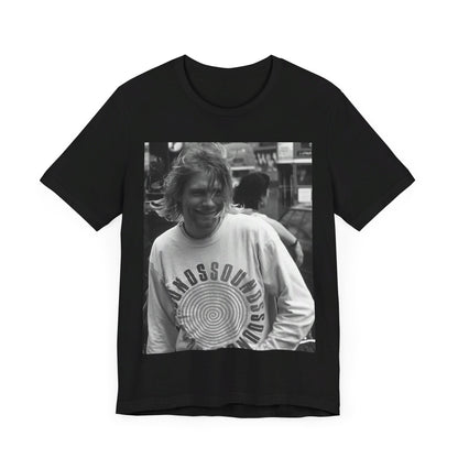 A black graphic t-shirt featuring a vintage rock legends graphic of Nirvana.