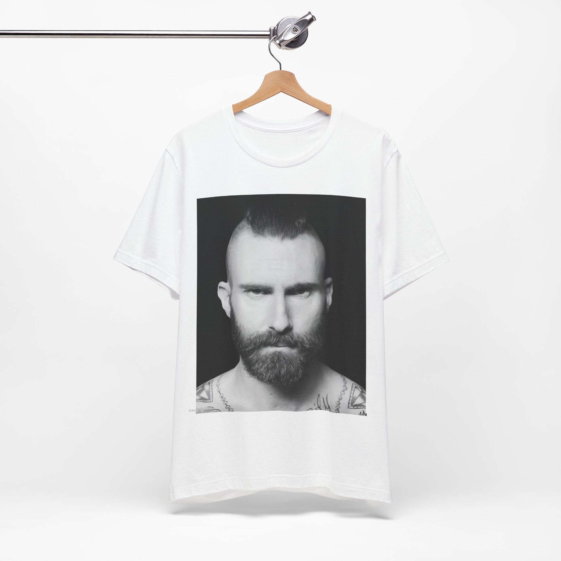 A sharp, polished studio portrait of Maroon 5 frontman Adam Levine, printed on a graphic t-shirt.