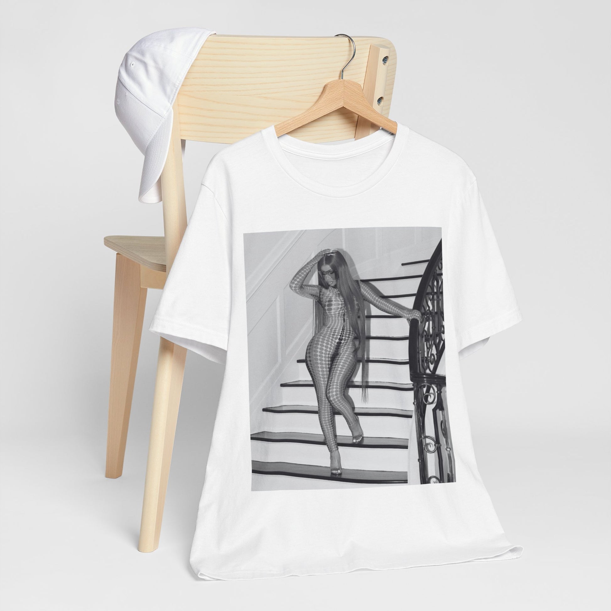 A black graphic t-shirt featuring a graphic of Cardi B as an authentic culture icon.