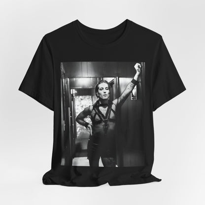 A black graphic t-shirt featuring a graphic of Maneskin emphasizing a rebel rock spirit.